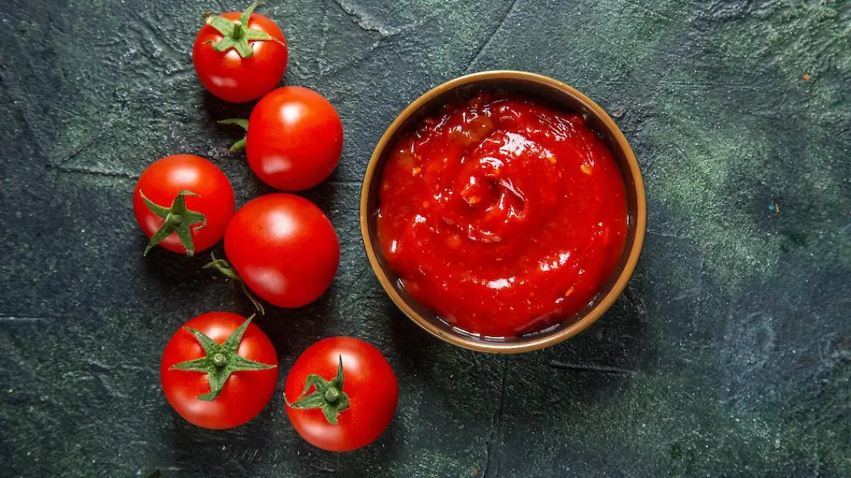 top view fresh red tomatoes with tomato paste on dark background bread burger snack meal fast food breakfast photo food