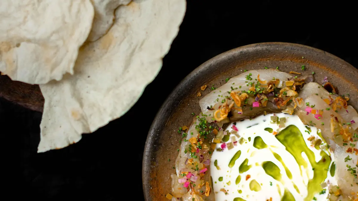 Fish  crudo  sour cream lacto fermented celery