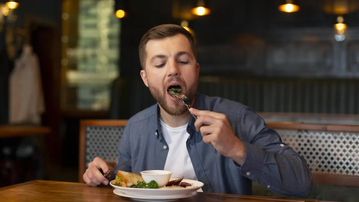 medium shot man eating