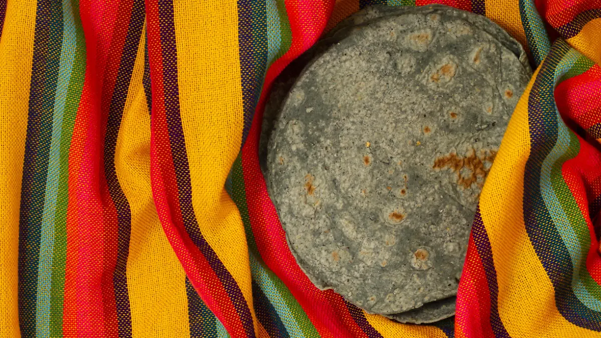 top view spinach tortilla on fabric
