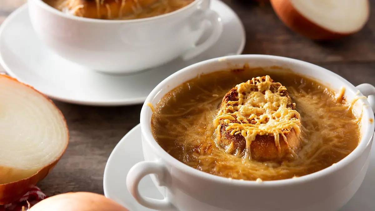 french onion soup on wooden table 123