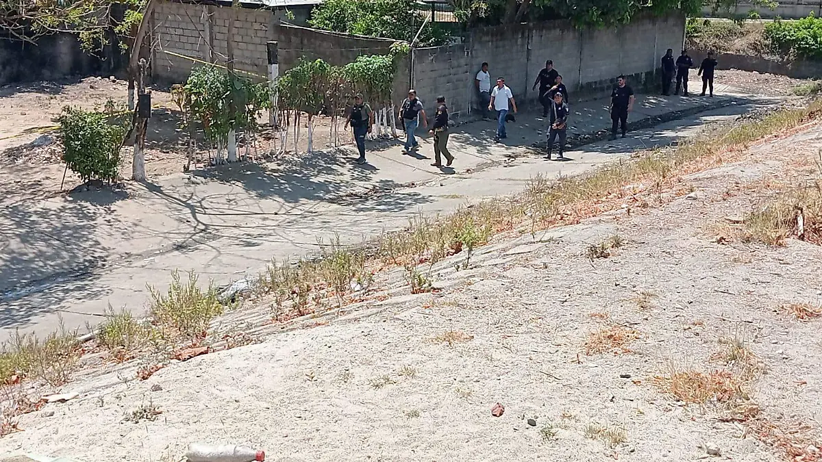 AUTORIDADES EN ZONA DE ASESINATO