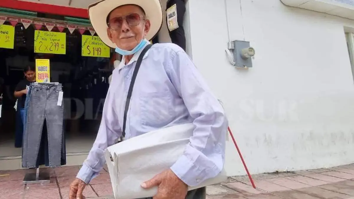Papá vende periódico