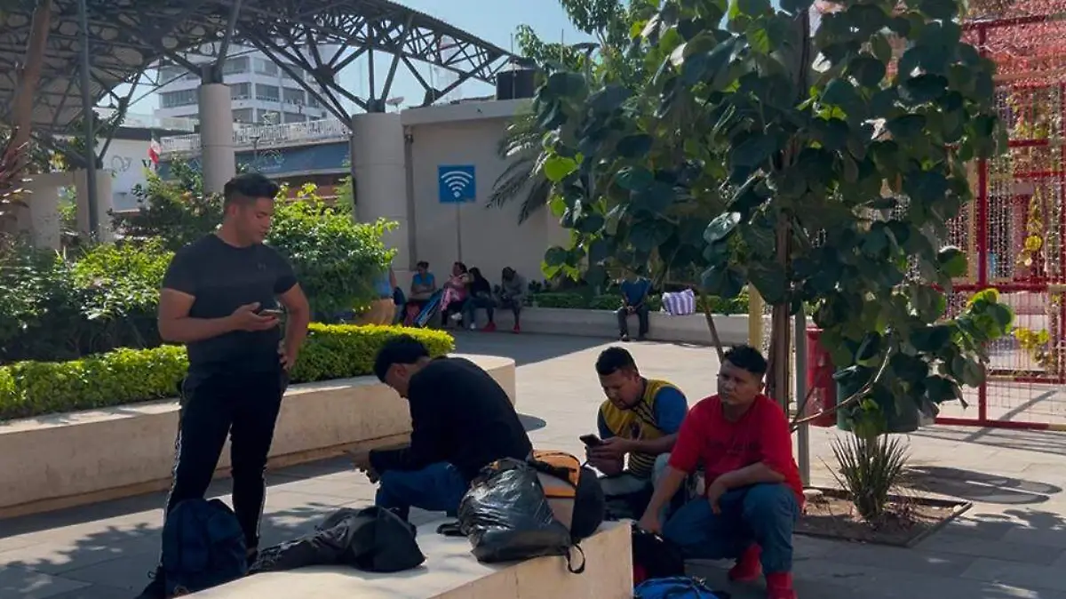 migrantes en parque central