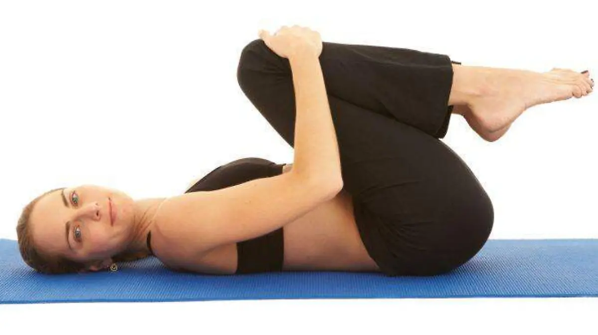 4. Rodillas al pecho