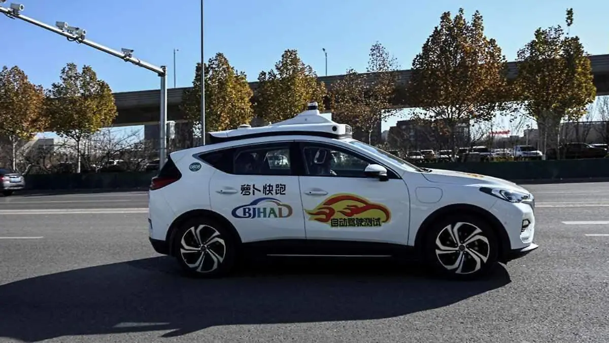 Taxis son conductor-Pekin-AFP