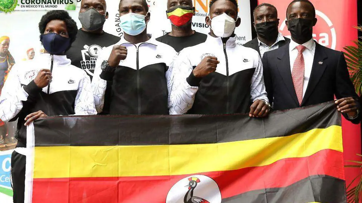 atletas-uganda-llegar-japon-AFP