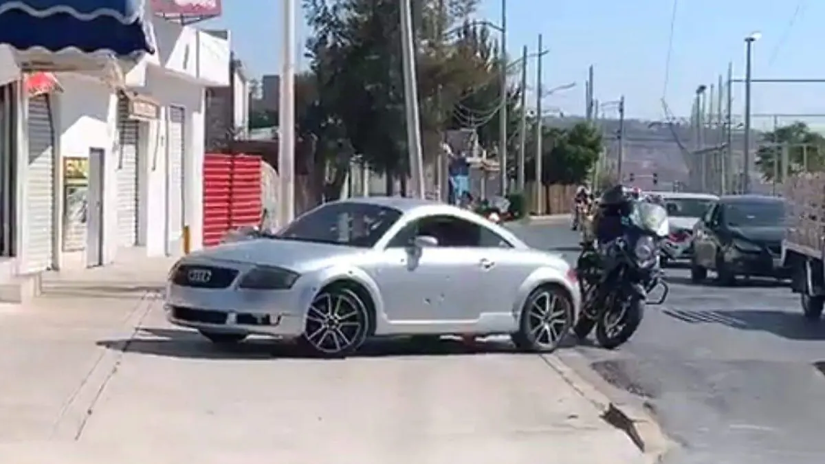 carro baleado
