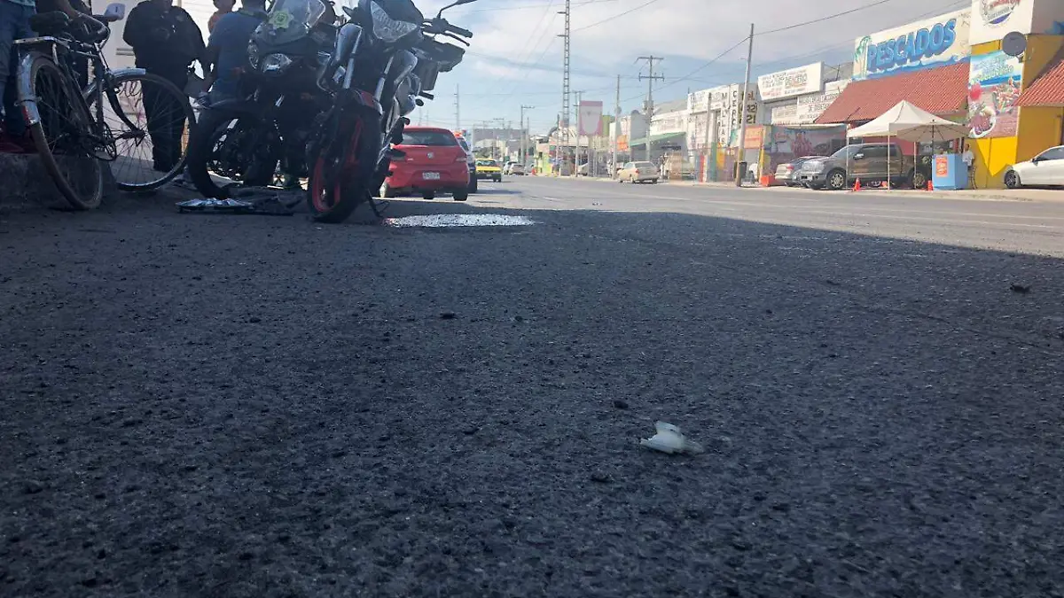tiran a amotociclista