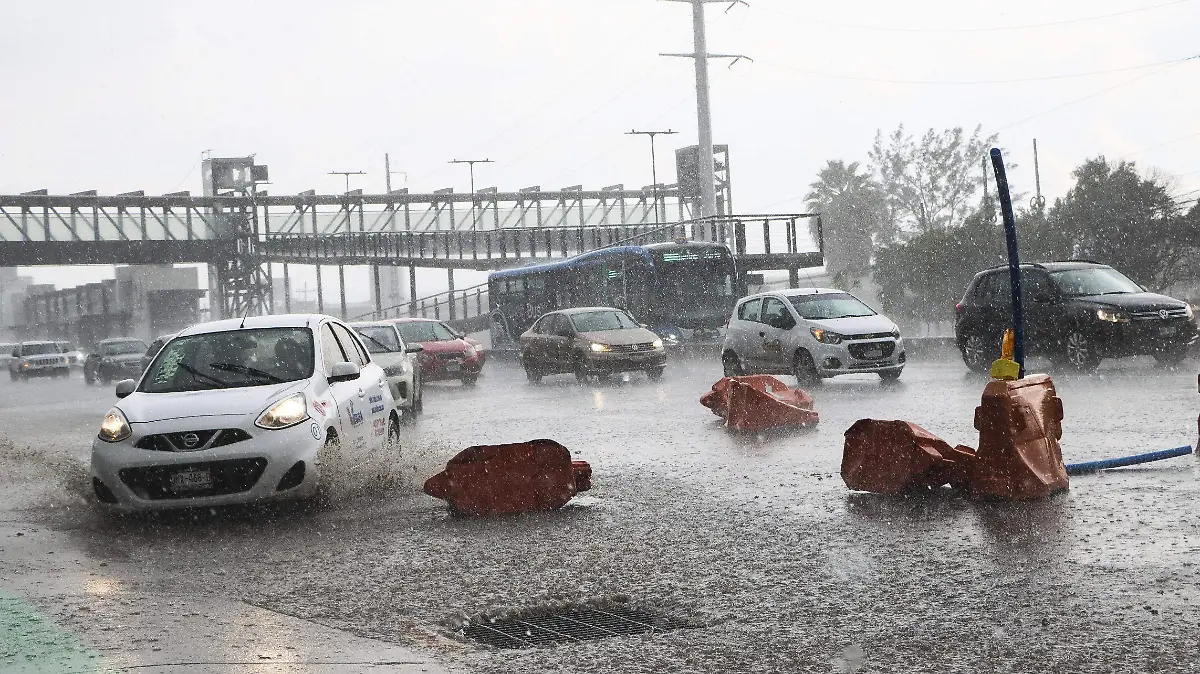 240914_5 DE FEBRERO_LLUVIA_MC_9