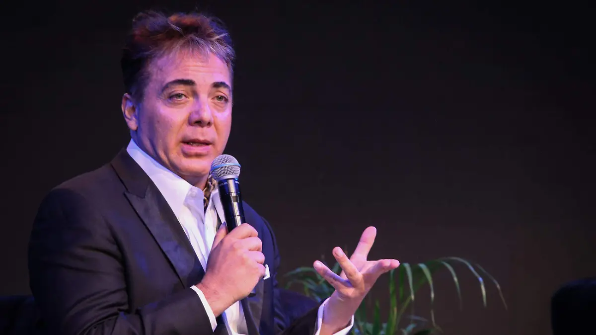 966972_Conferencia Yuri y Cristian Castro_impreso