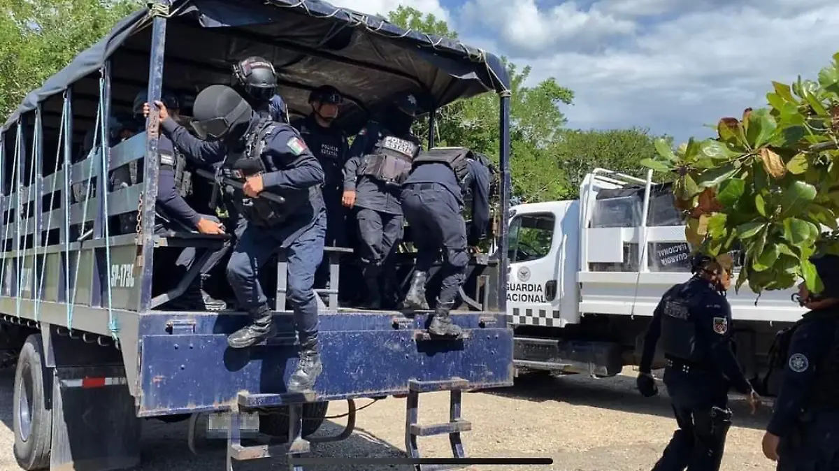 policía migrantes