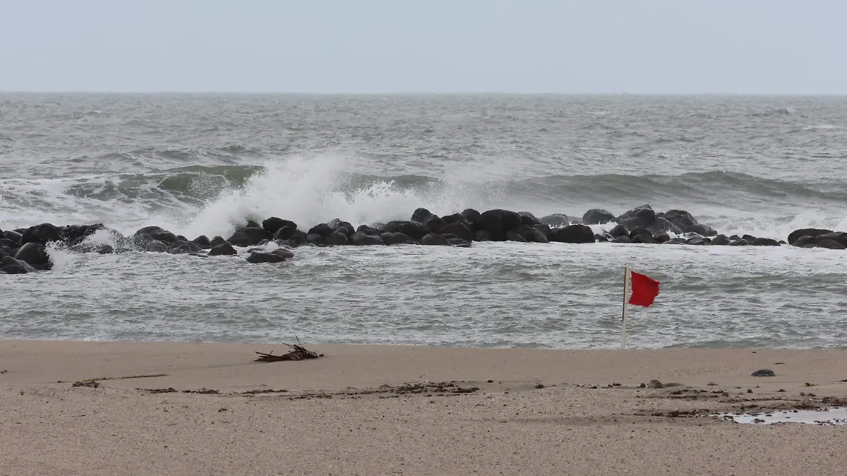 Frente frío, playas cerradas