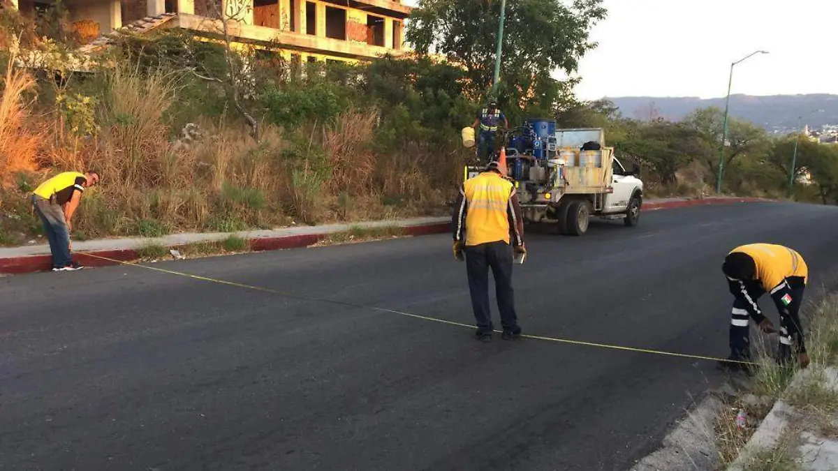 trabajadores en carreteras
