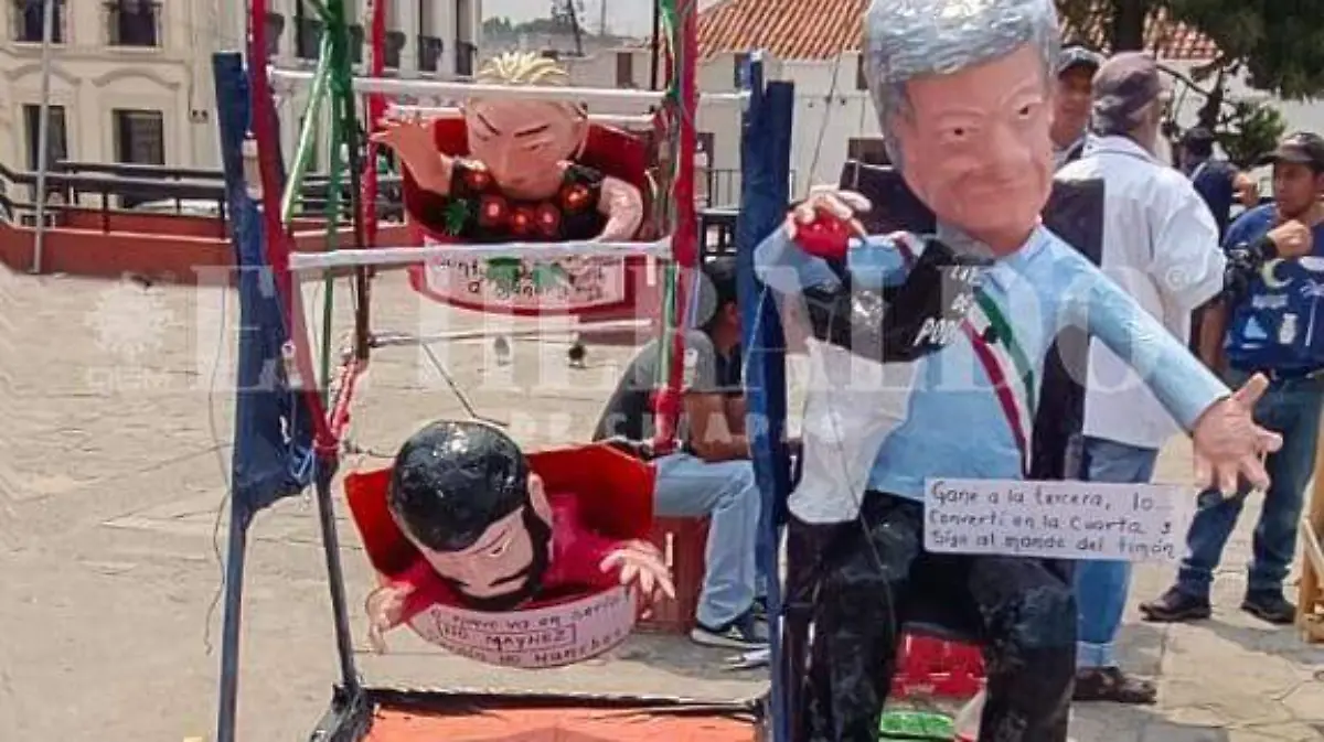 Quema de Judas con el rostro de candidatos