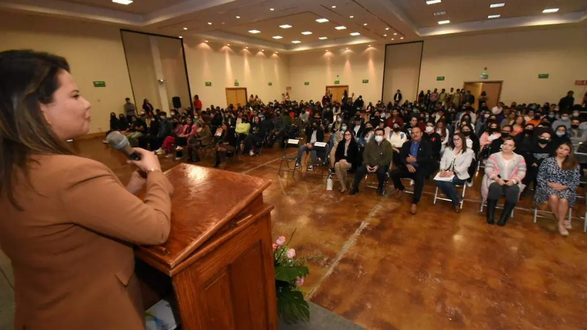 uach conferencia cancer de mama