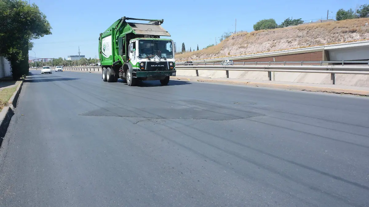 BACHE EN AV, TEOFILO BORUNDA SUR, FUE REPARADO   (2)
