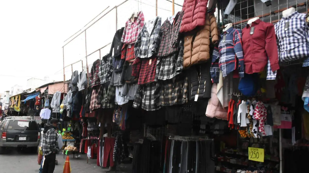 negocios tiendas de ropa mercado chamarras frío 