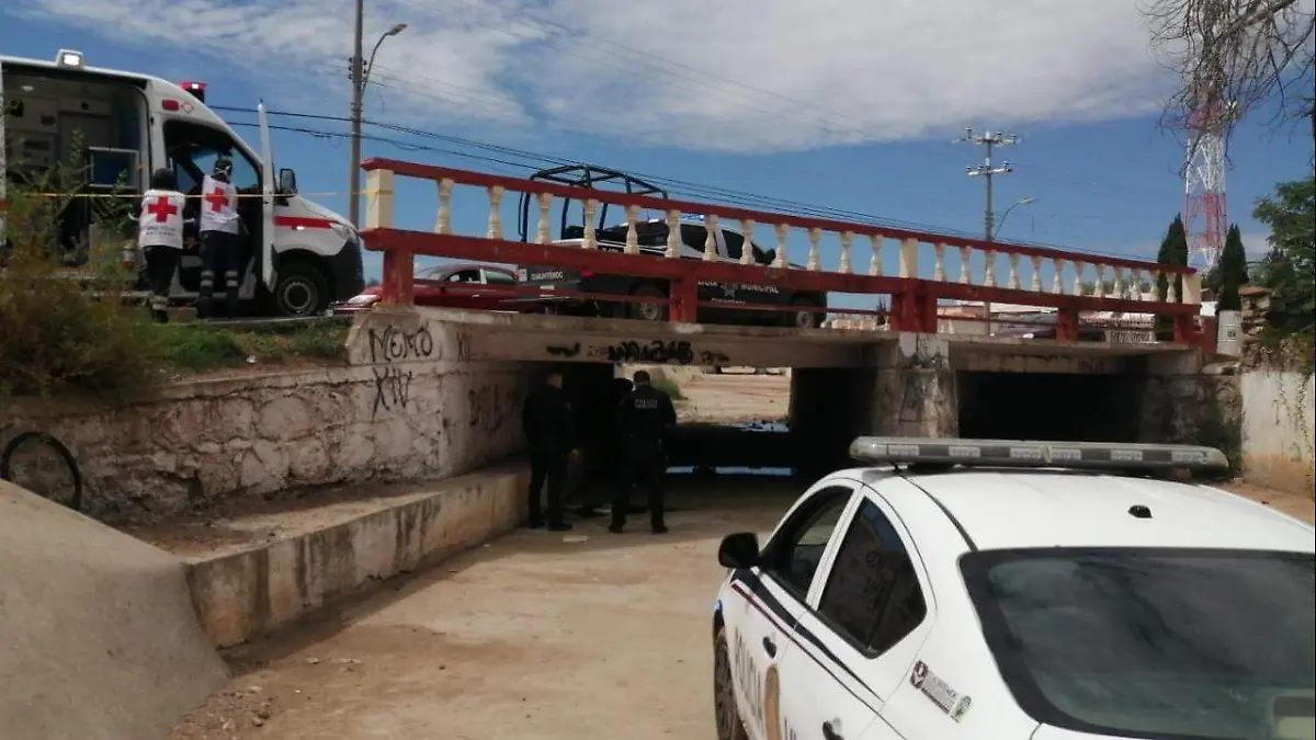 Muerto bajo puente