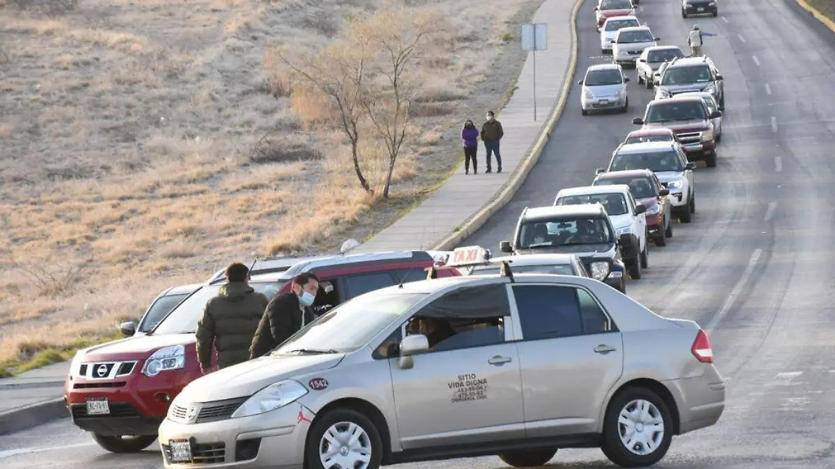 filas vacunas covid 2+