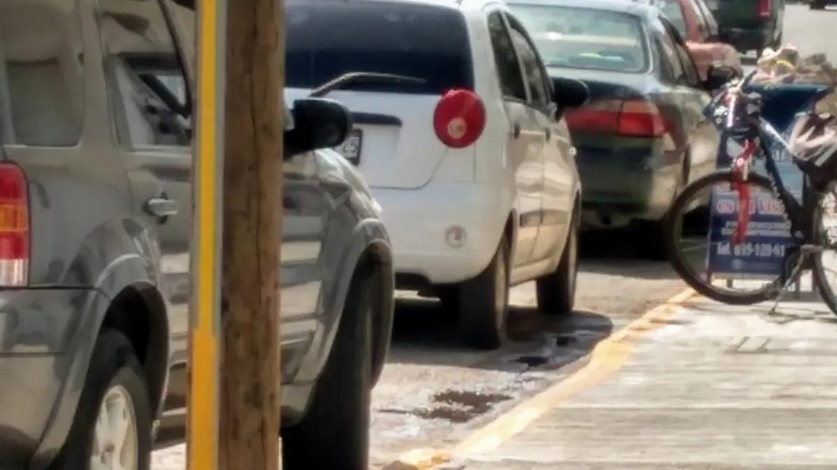 Se apropian comerciantes de cajones - copia