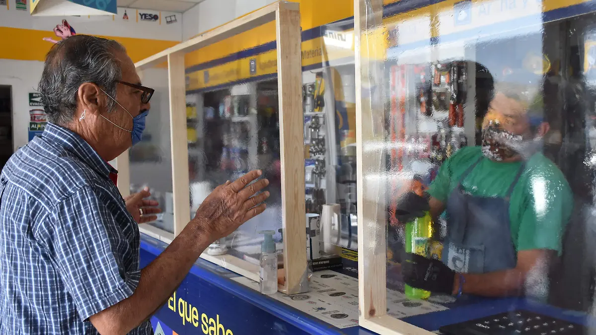 locatarios se protegen con del cobid -19 (3)