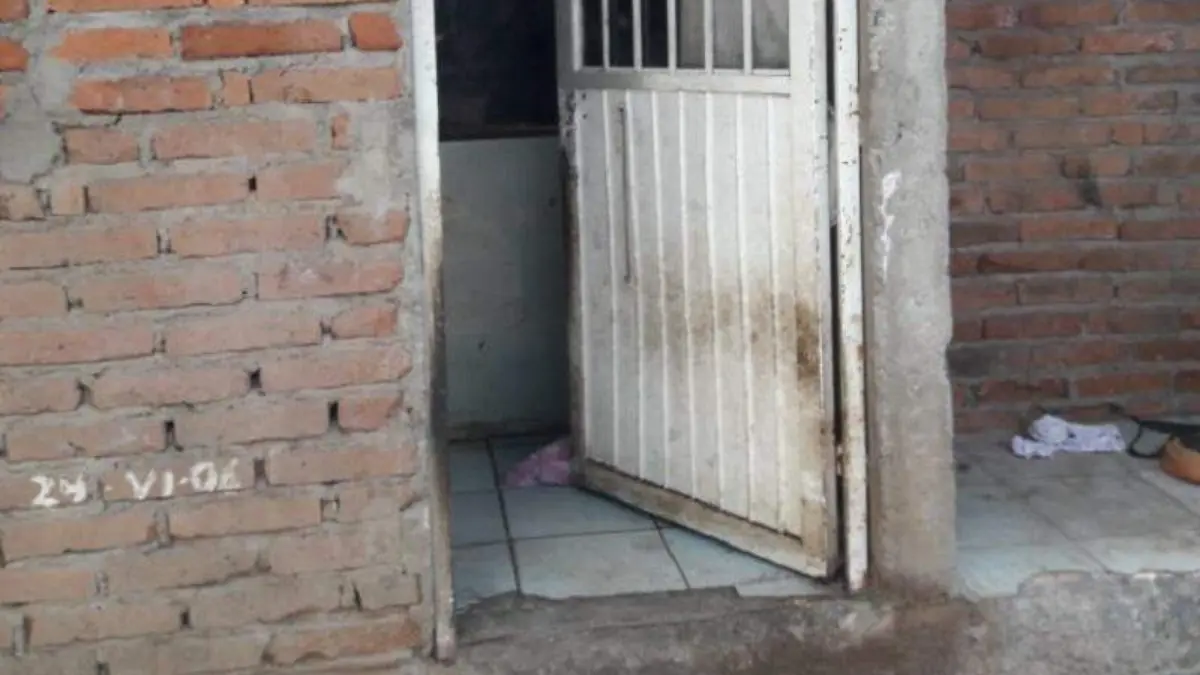 La vivienda donde fueron localizados sin vida%2c una madre y sus dos hijos