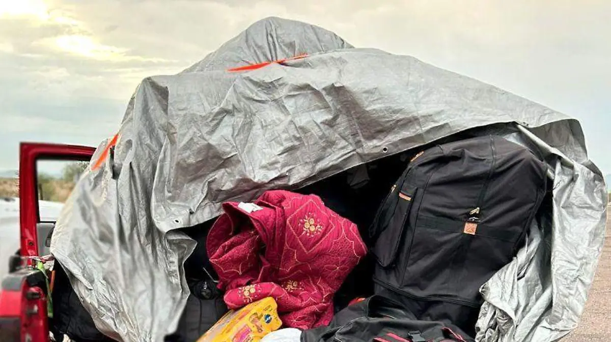 ARSENAL ESCONDIDO EN VEHÍCULO