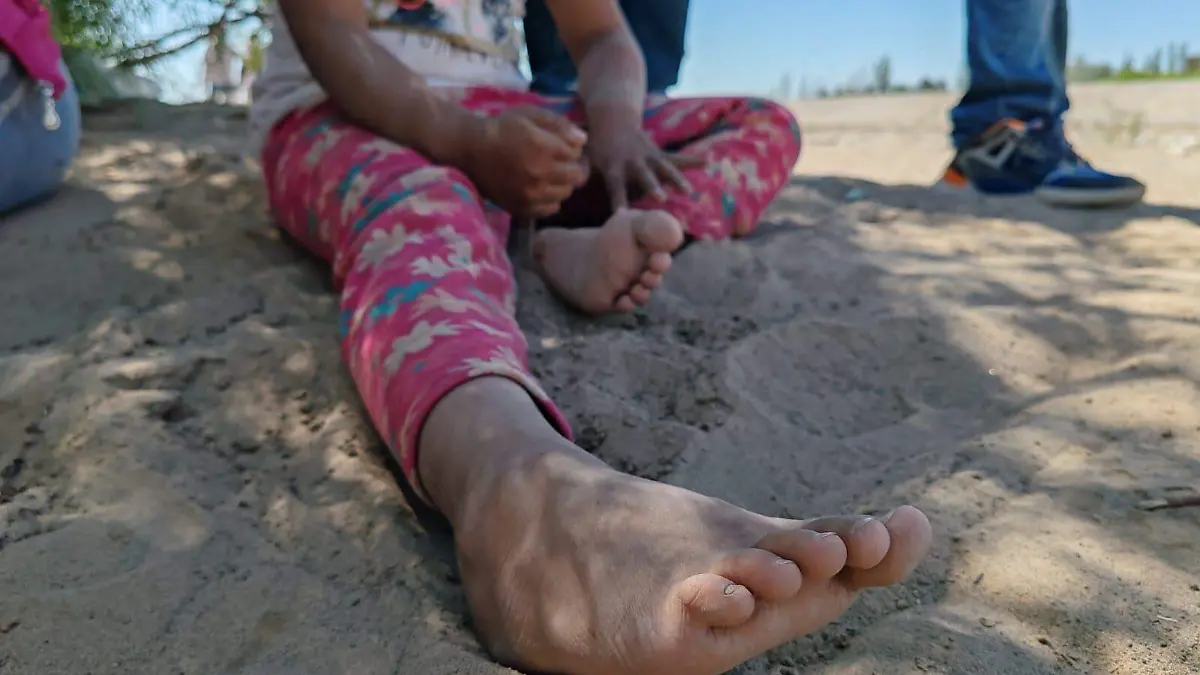 niña migrante