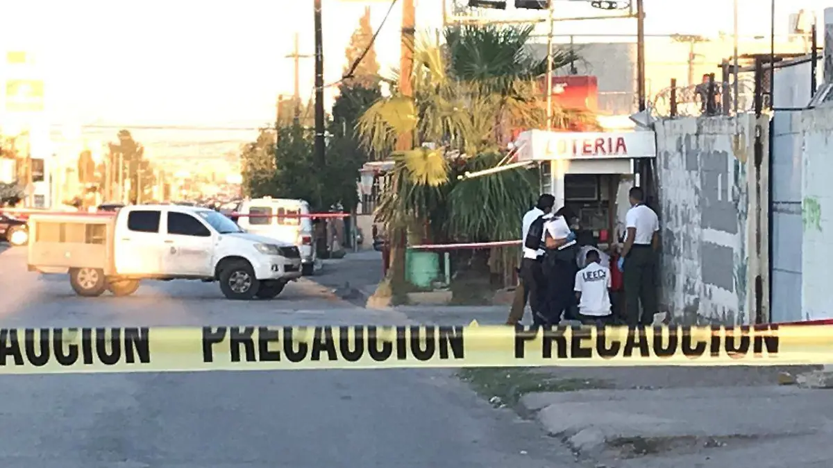 asesinado puesto de loteria
