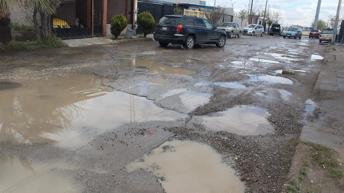 calle tubares con baches. olga casas (7)