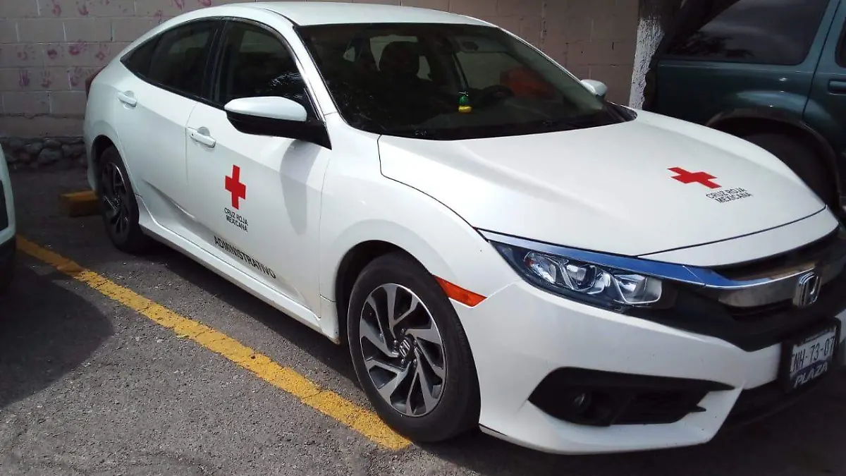 Auto de la cruz roja