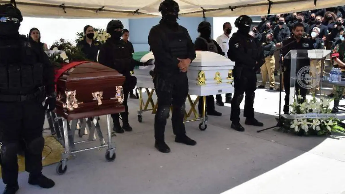 despiden a agentes muertos