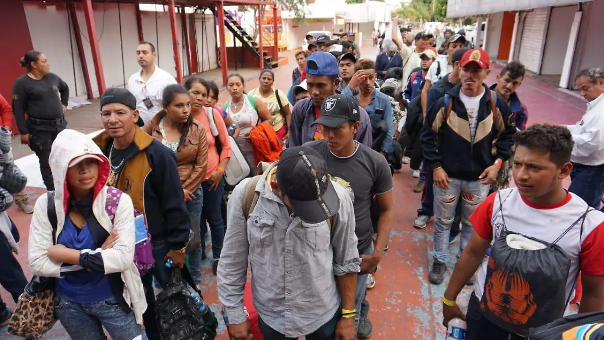 Migrantes en el Auditorio Benito Juárez