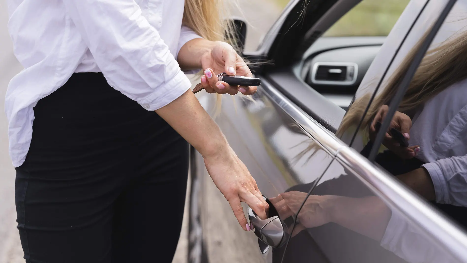 side-view-of-woman-opening-car-door