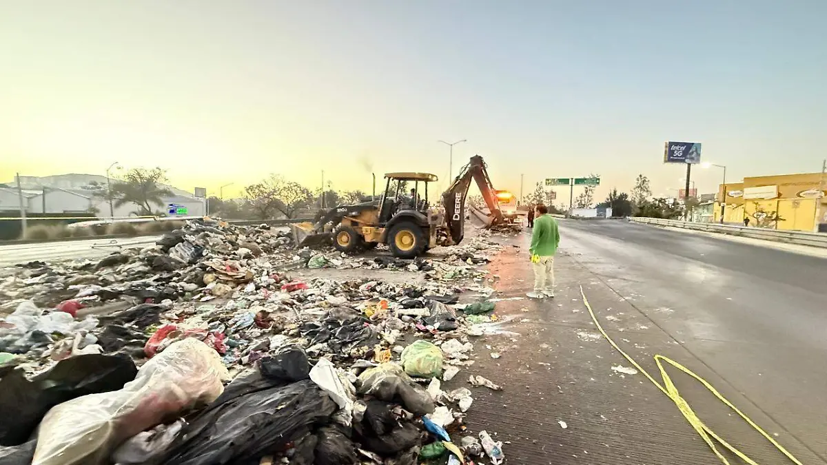 Accidente trailer basura