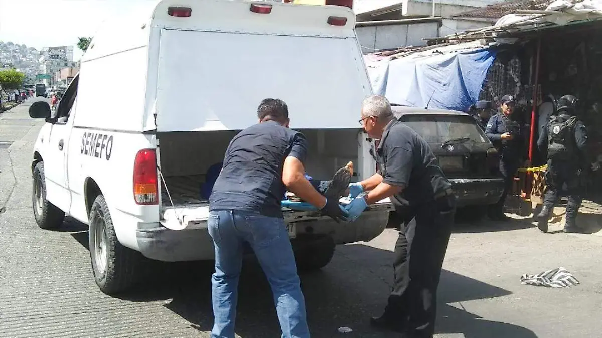 muerto en mercado de artesanías