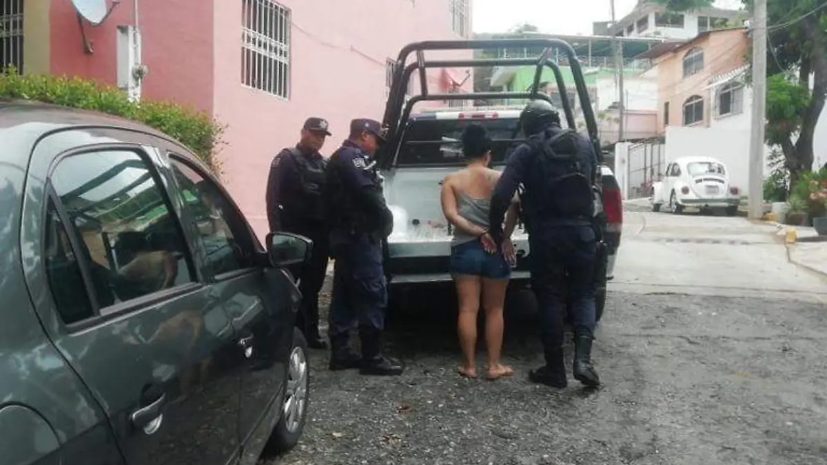 Acapulco - Mujer golpeada