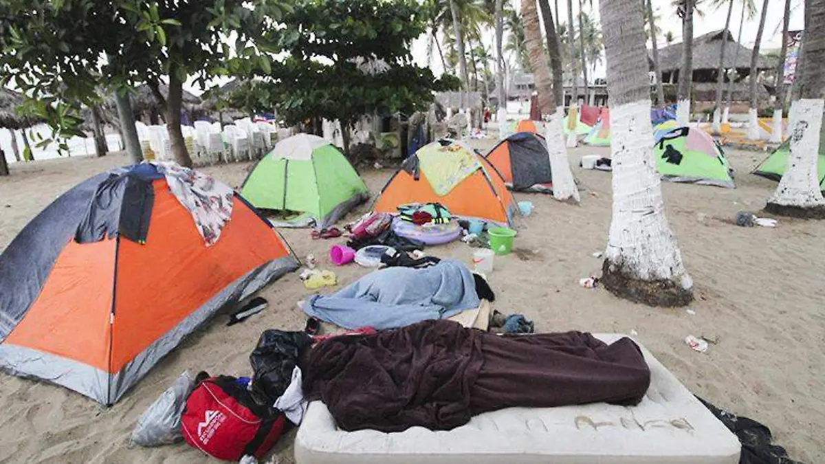 duermen en playa