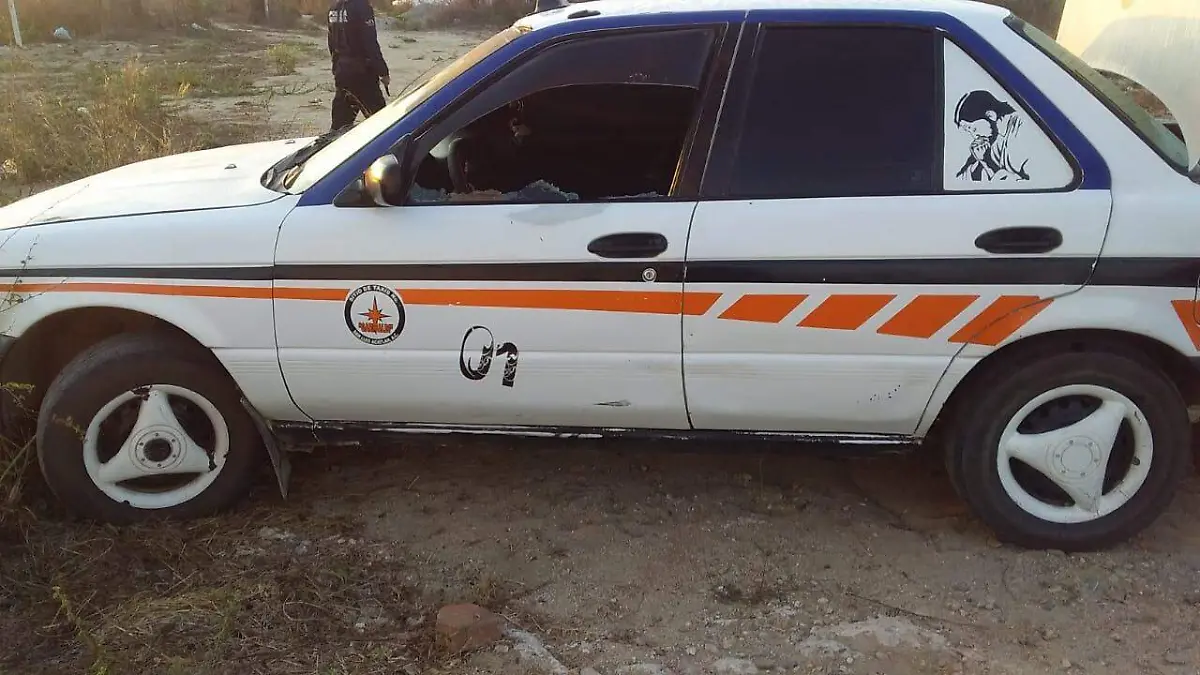asesinada taxi