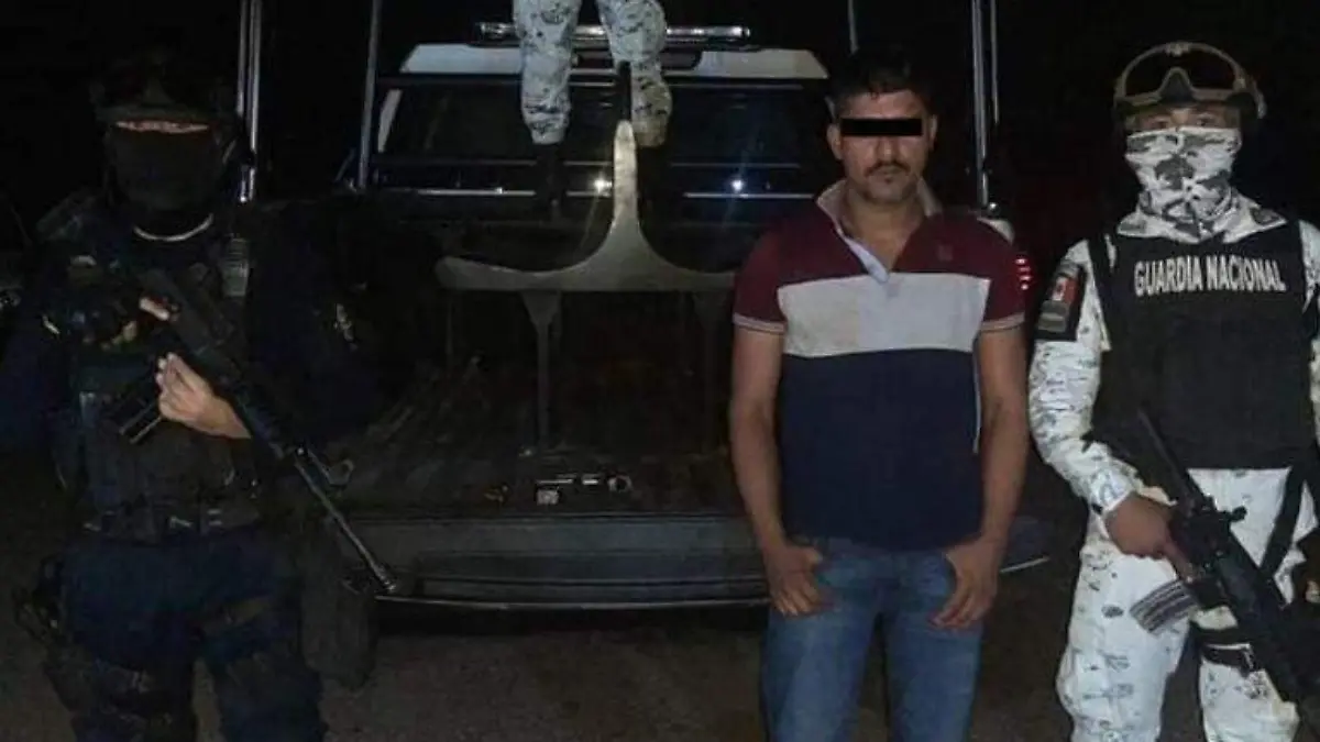 detenido arma de fueo