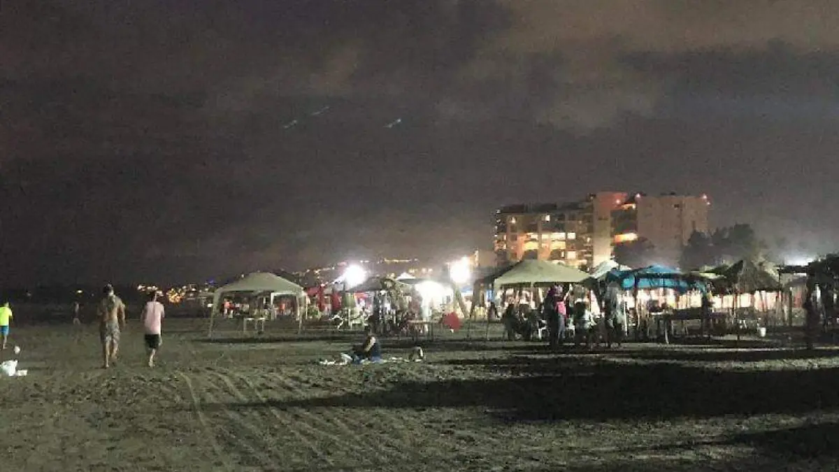 Playa turistas desalojo