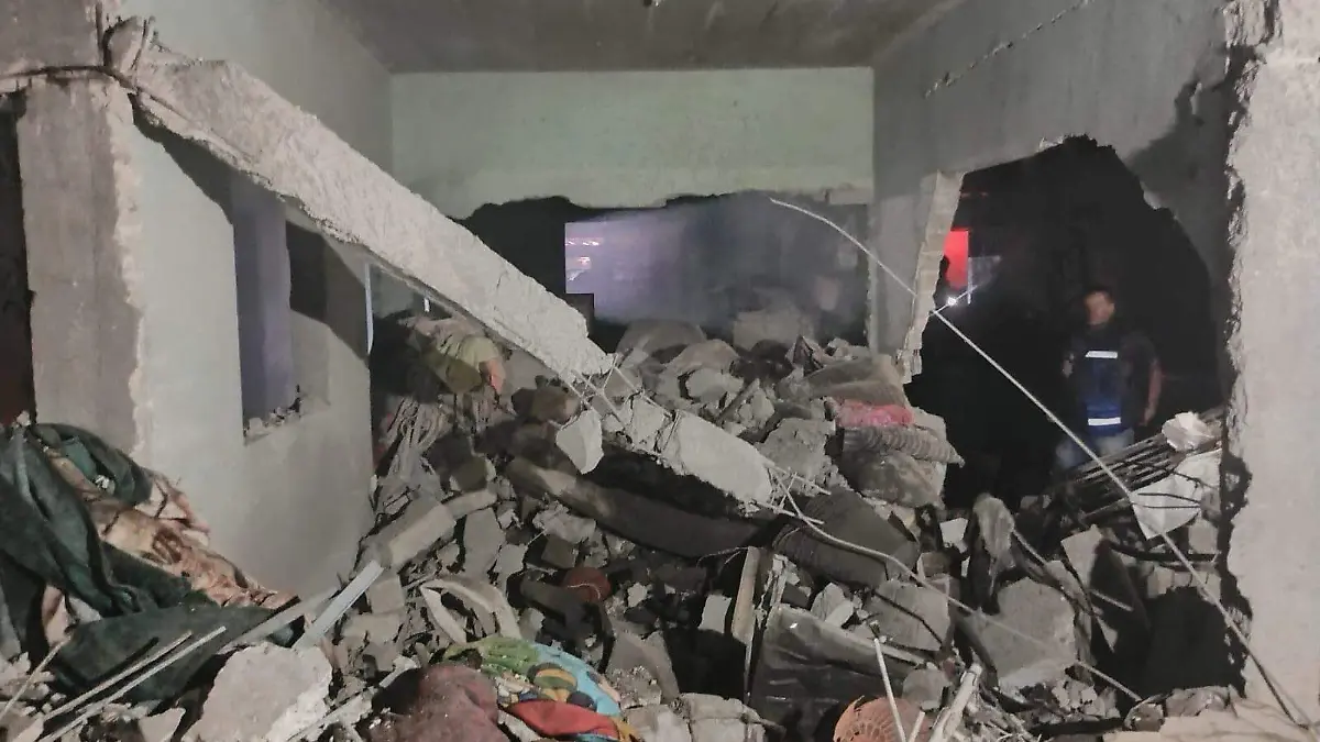 casa dañada por polvorin