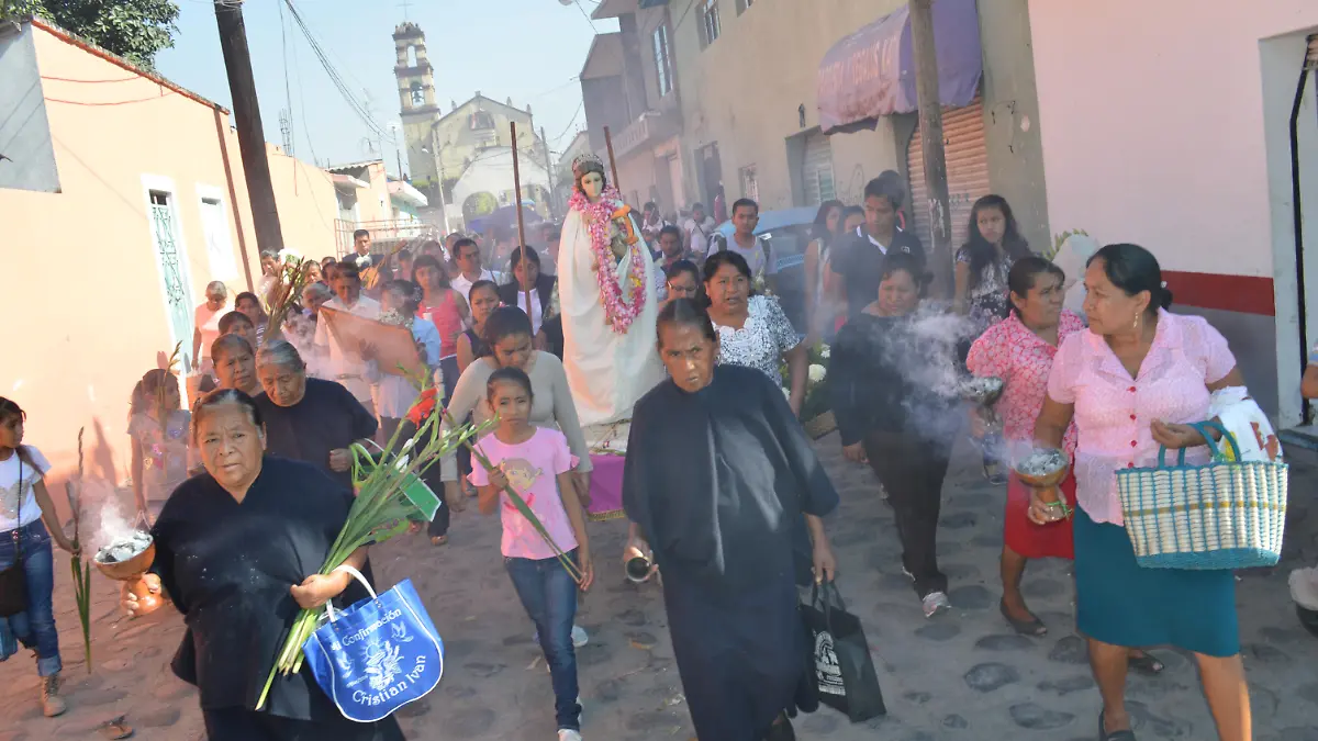 PROCESIÓN DE habitantes tetelcingas