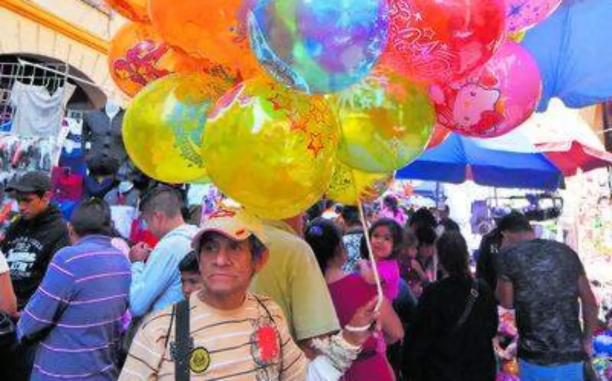 La suerte de los globeros era el día de Reyes/Fotos: Froylán Trujillo