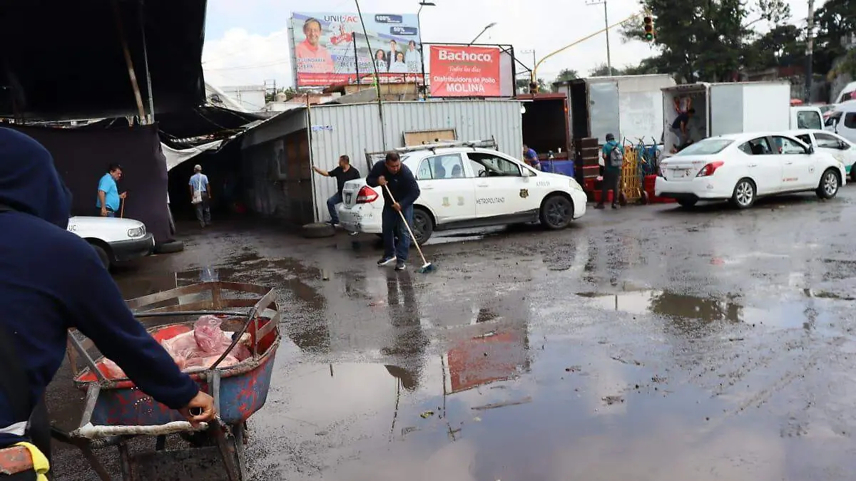 comerciantes-lluvia1-luis-flores