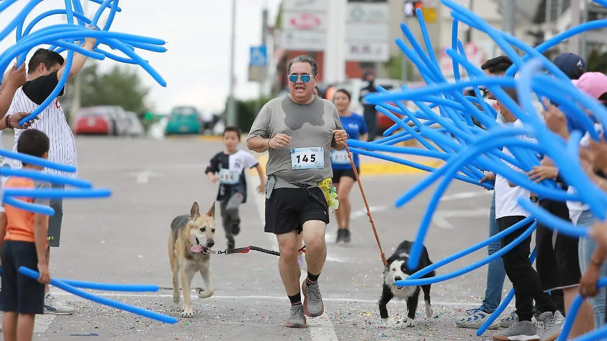Todos a correr en compañía de su perro