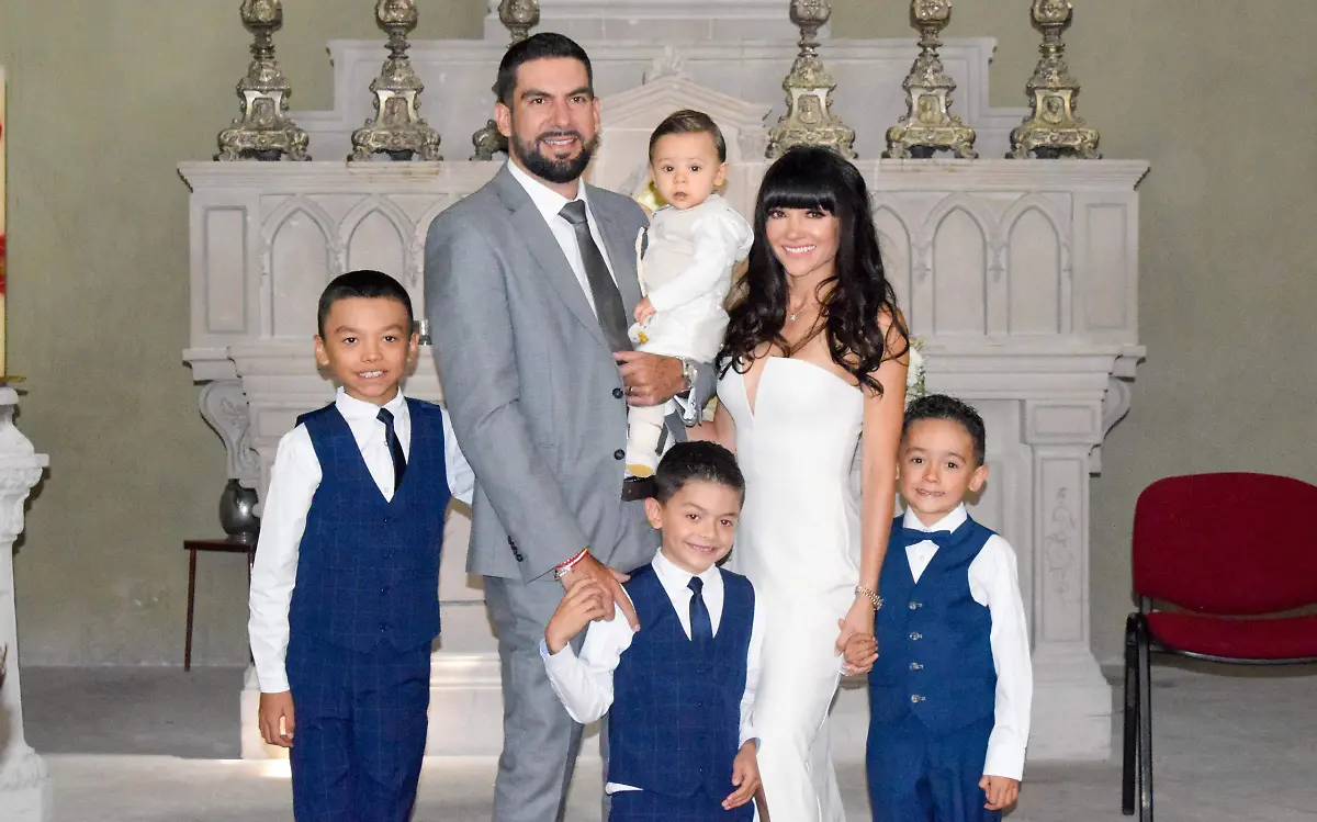 Con sus padrinos los Rosas Bruciaga