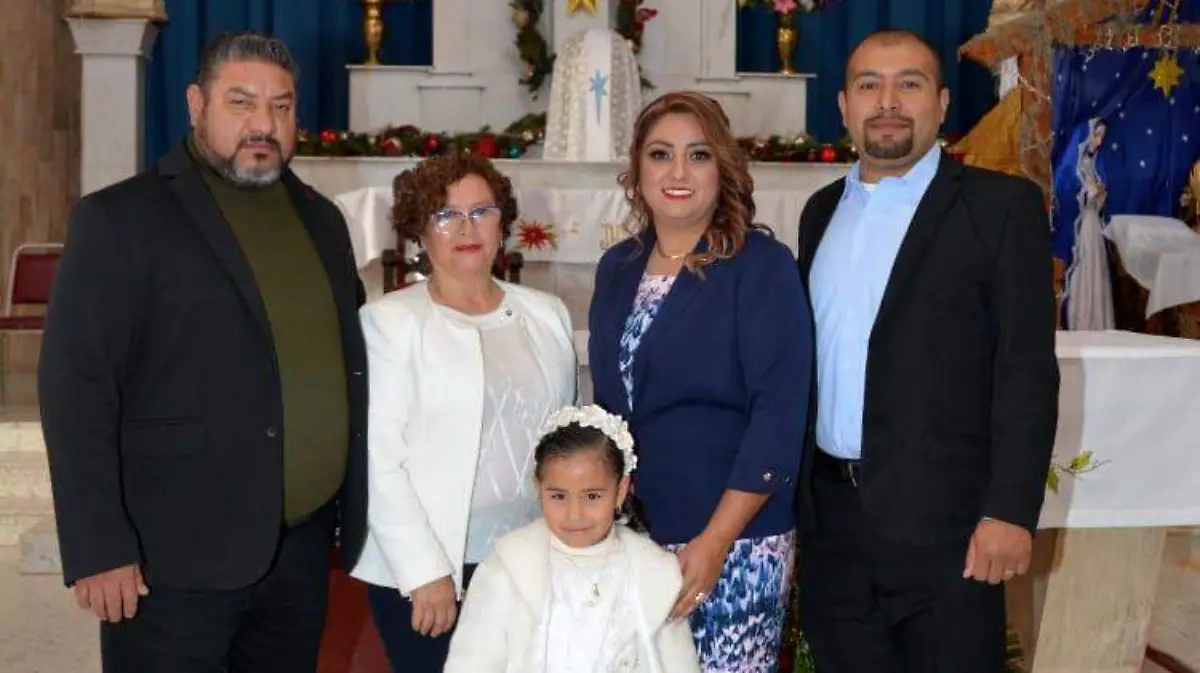 Doble celebración en el Bautizo de Karime