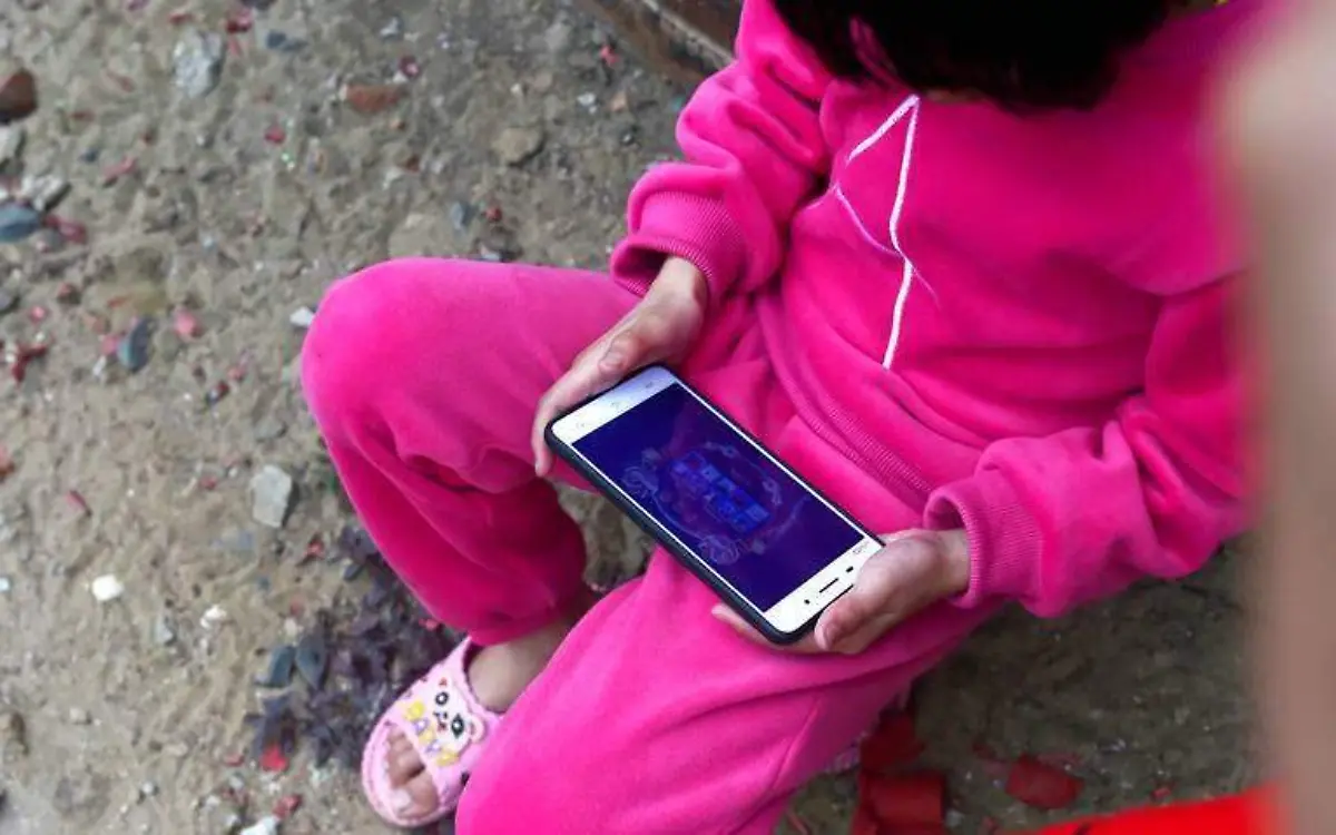 2018-02-16T120000Z_1536375961_MT1IMGCNPBU75559505_RTRMADP_3_CHINA-KIDS-MOBILE-GAMES